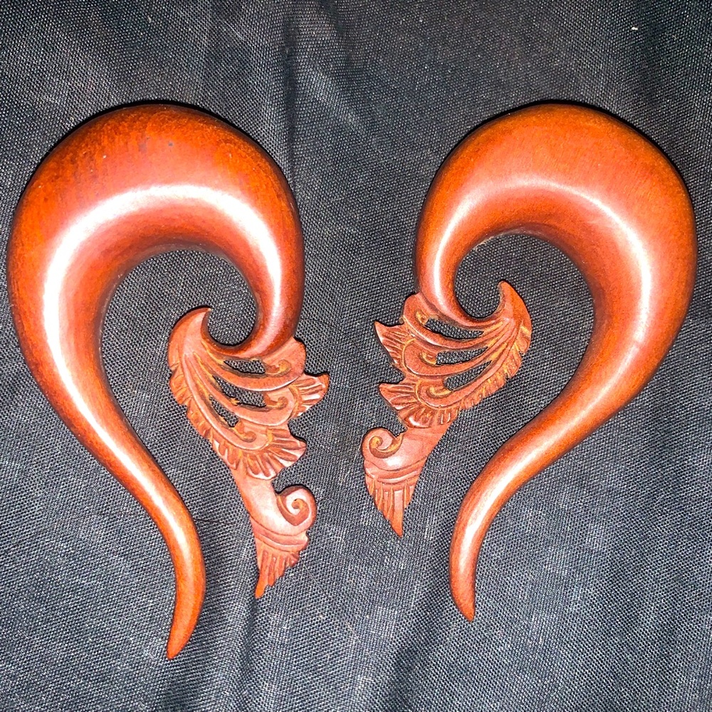 Never worn real handcrafted hand carved wood size 00 hangers